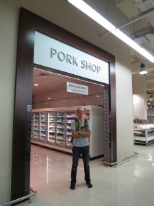 In Waitrose, in the basement of the Dubai Mall, giggling giddily at the notion of a separate room dedicated to pork products
