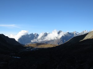 Looking back the way we came, from the Chola Pass, as the sun makes its way across the valley