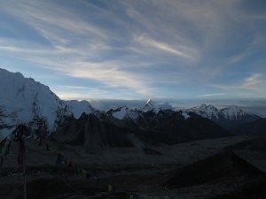Looking down the Khumbu Valley from Kala Patthar as the sun begins to hit the snowy peaks