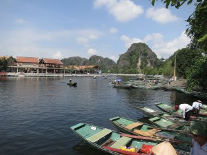 Boats on the Ngô Đồng River, waiting to row tourists out to Tam Cốc Boats on the Ngô Đồng River, waiting to row tourists out to Tam Cốc