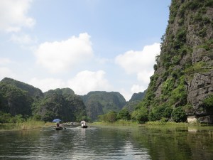 On our boat, rowing amidst the limestone karsts On our boat, rowing amidst the limestone karsts