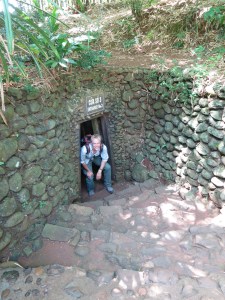 Standing/crouching in an entrance to the Vinh Moc Tunnels Standing/crouching in an entrance to the Vinh Moc Tunnels