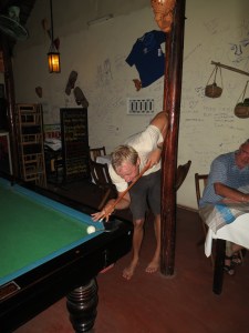 Trying to play pool with somewhat limited room in a bar in Hoi An Trying to play pool with somewhat limited room in a bar in Hoi An