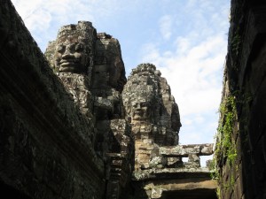 Inside the Bayon, looking up to faces unperturbed by the passage of time and glory