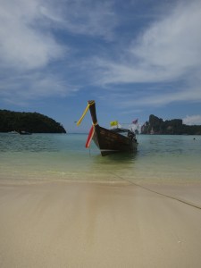A longtail moored at the beach in Loh Da Lum Bay, Ko Phi Phi Don