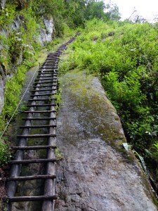 Ladders on the climb up some rock faces on the trail up Putucusi Mountain